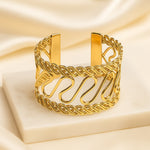 Load image into Gallery viewer, Golden Spiral Cuff Bracelet
