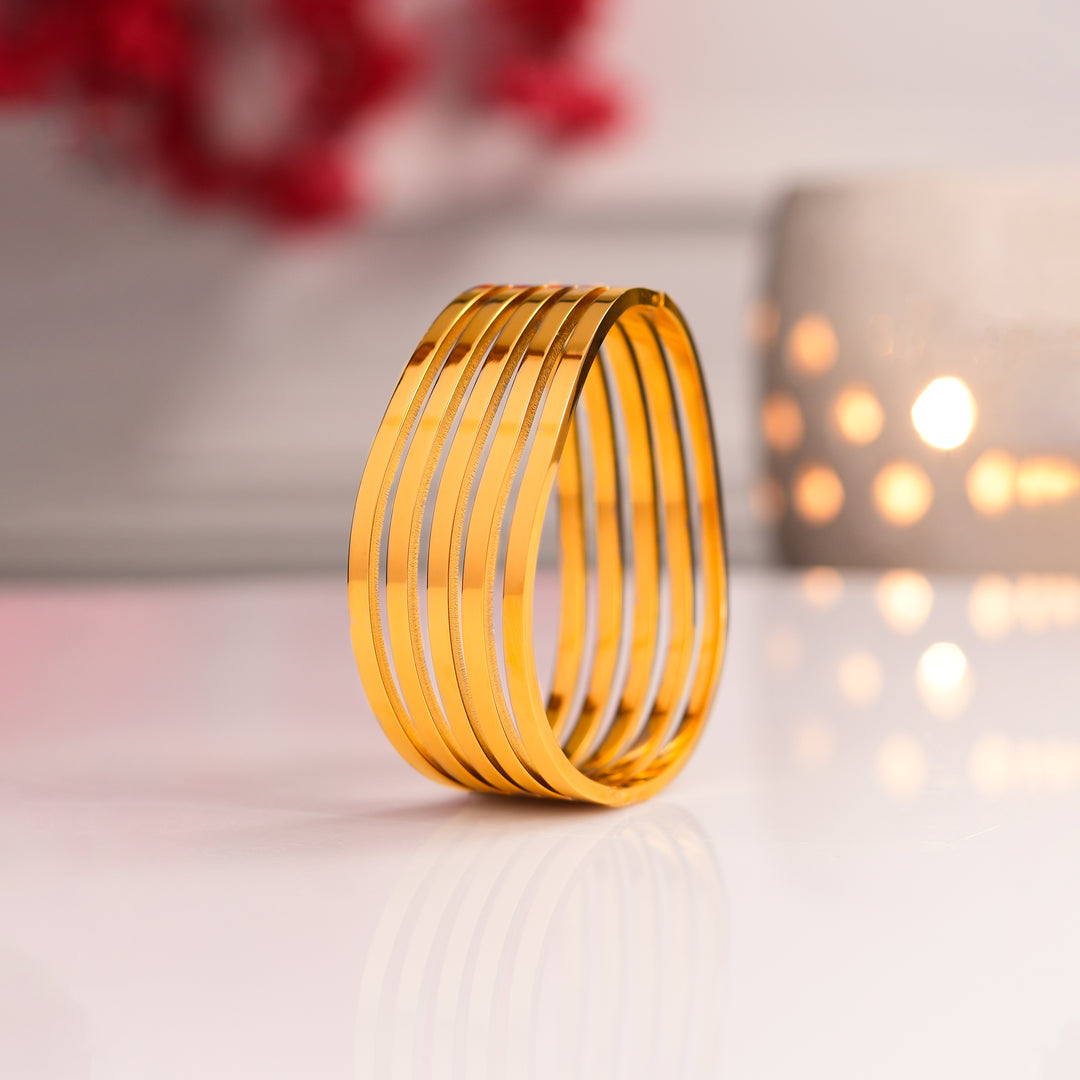 Gold Twisted Bangles Shape Bracelet