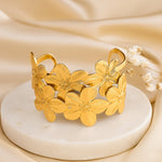 Load image into Gallery viewer, Floral Golden Statement Cuff Bracelet
