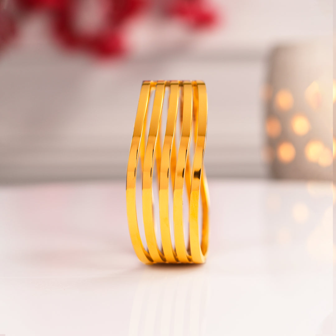 Gold Twisted Bangles Shape Bracelet