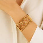 Load image into Gallery viewer, Golden Spiral Cuff Bracelet
