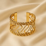 Load image into Gallery viewer, Golden Spiral Cuff Bracelet
