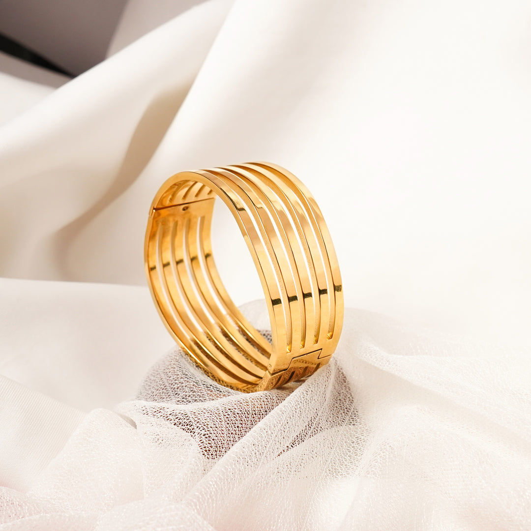 Gold Twisted Bangles Shape Bracelet